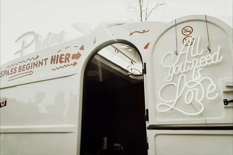 LED Schild am Caravan All you need is Love