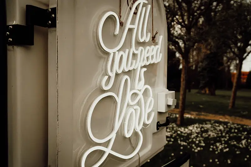 LED Schild am Caravan All you need is Love